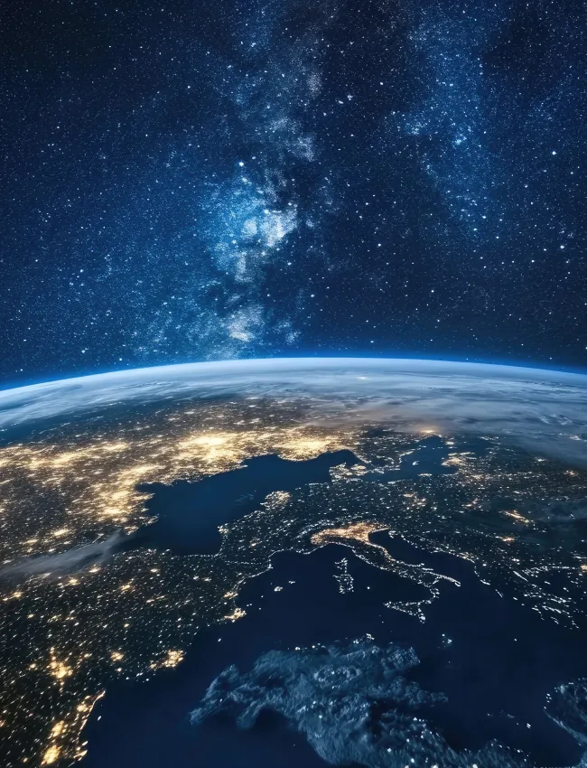 Earth at Night Showing City Lights and Milky Way