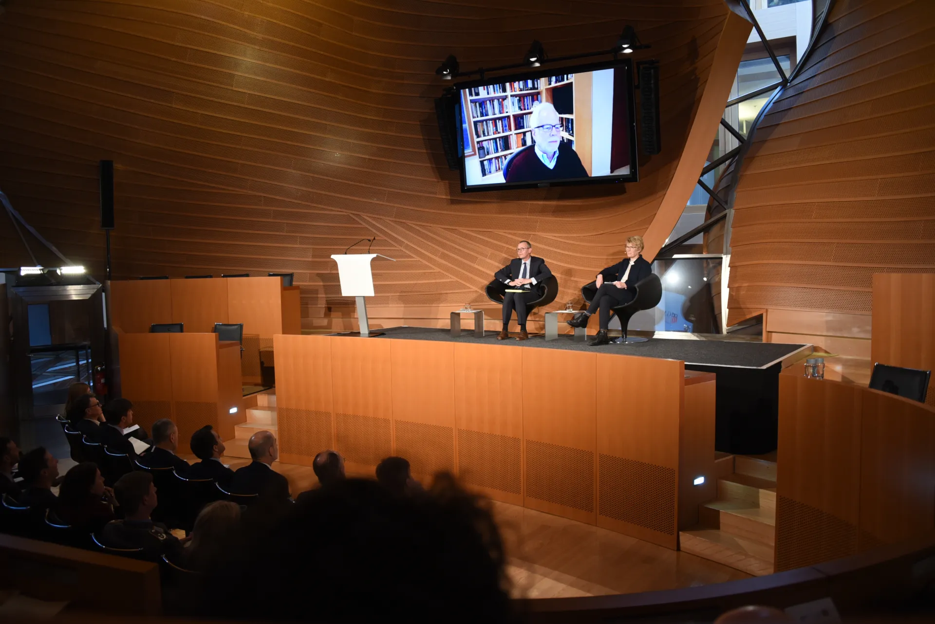 Barry Eichengreen, Veronika Grimm, and Ralf Roloff discussing at anniversary conference in Berlin, March 2023